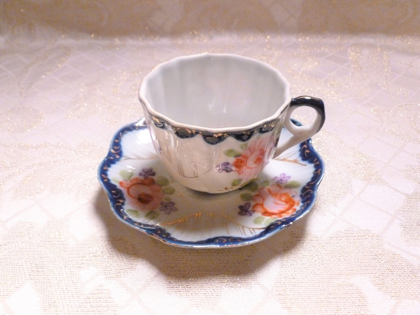 Vintage Floral Bone China Cup and Saucer, Cobalt Blue Trim