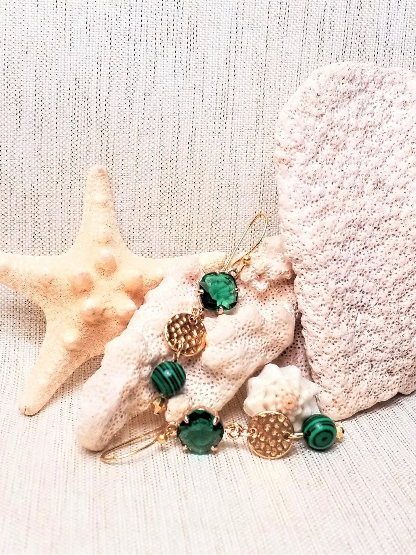 Elegant handcrafted earrings. Ideal for weddings and special occasions. Ear wires with beautiful very emerald green diamond shape crystals tops connected to a small golden circle and added pretty malachite stone bead hanging on the end.  Thank you!